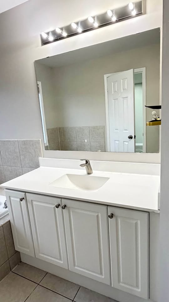 Spotless commercial washroom vanity after an overnight office clean